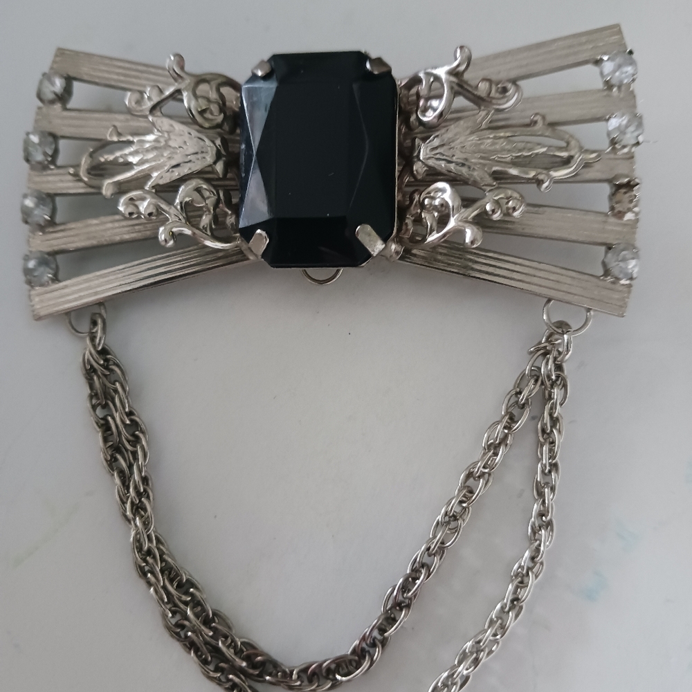 Vintage brooch large bow in silver tone with black accent stone